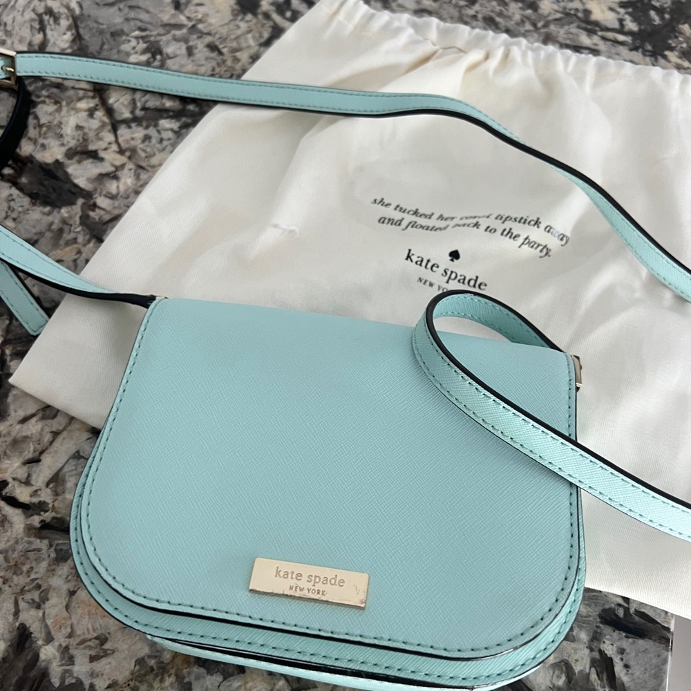 Kate spade lovely small crossbody light aqua bag! Fun for spring and summer